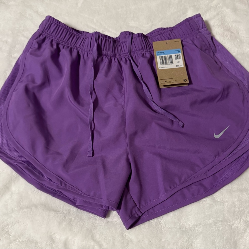 Purple Nike shorts with attached brief